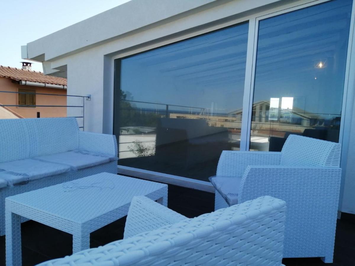 Villa Il Faro Племирио Екстериор снимка